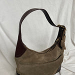 Rare vintage Coach bag from 2006 in suede and leather material. The bag is in a great condition.&nbsp;