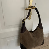 Rare vintage Coach bag from 2006 in suede and leather material. The bag is in a great condition.&nbsp;