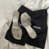 Rare Chanel CC logo travel line mules.