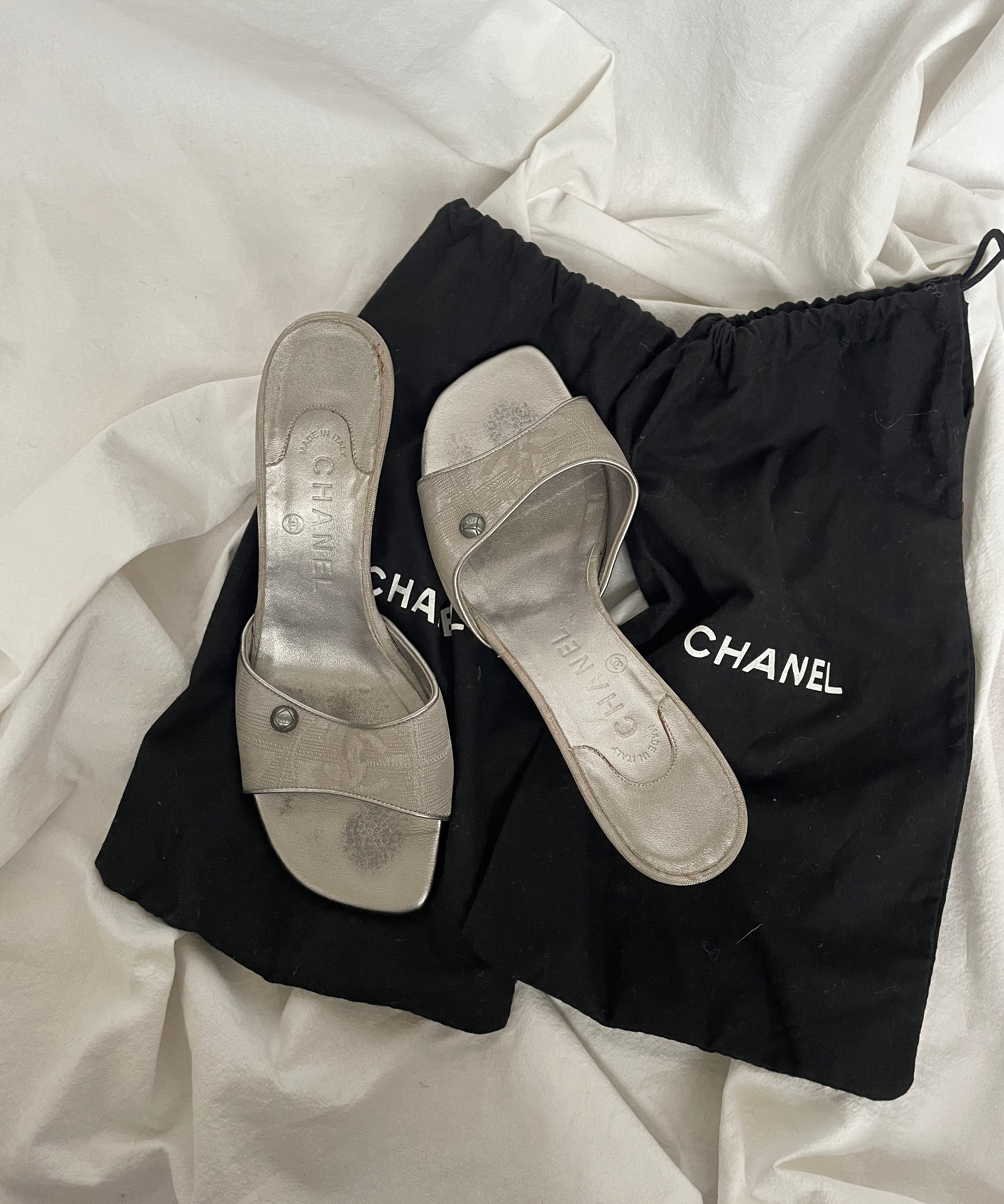 Rare Chanel CC logo travel line mules.