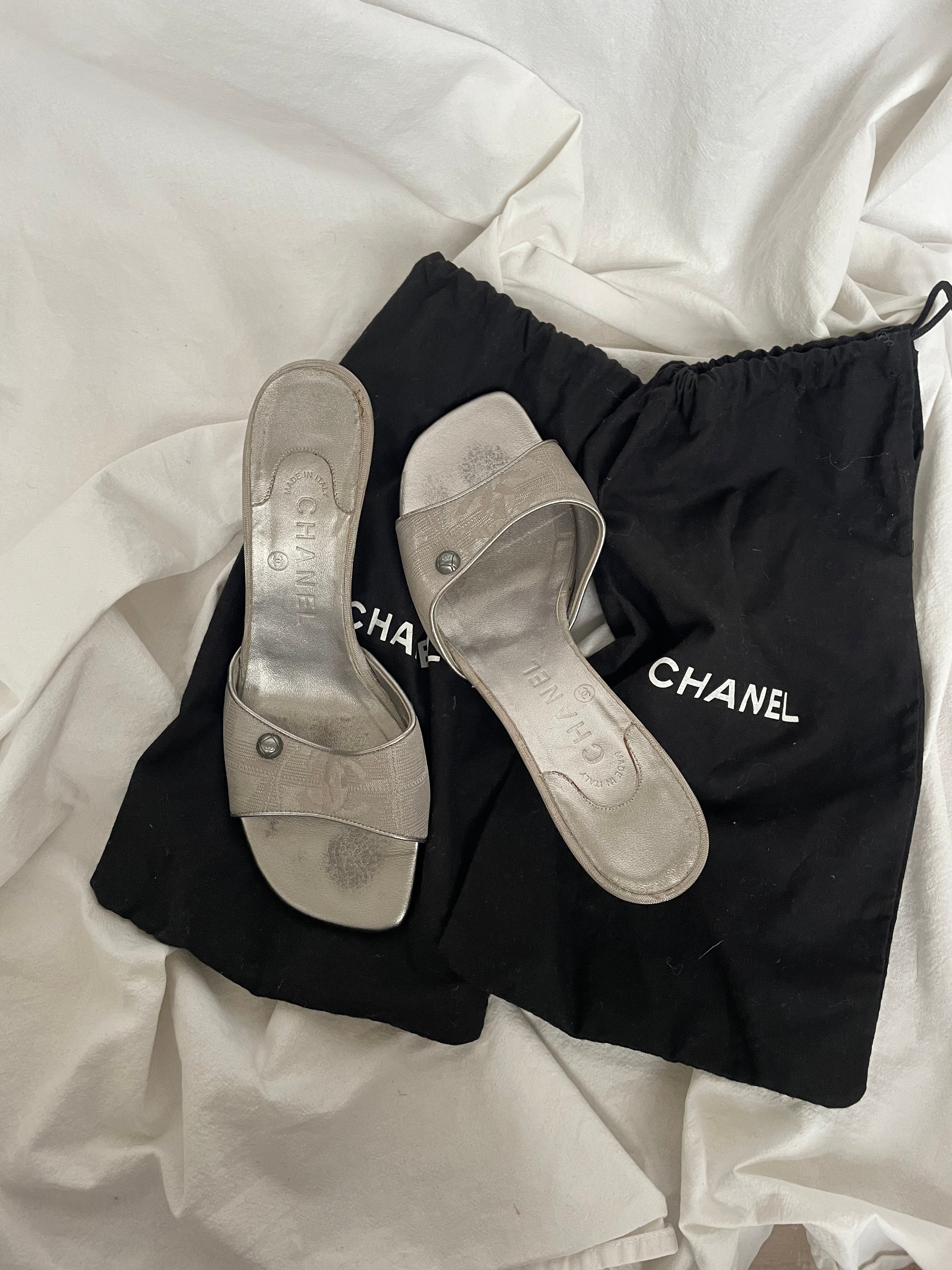 Rare Chanel CC logo travel line mules.