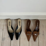 Prada buckle kitten heels. Vintage Prada heels with a pointed toe in a tan color with silver details.