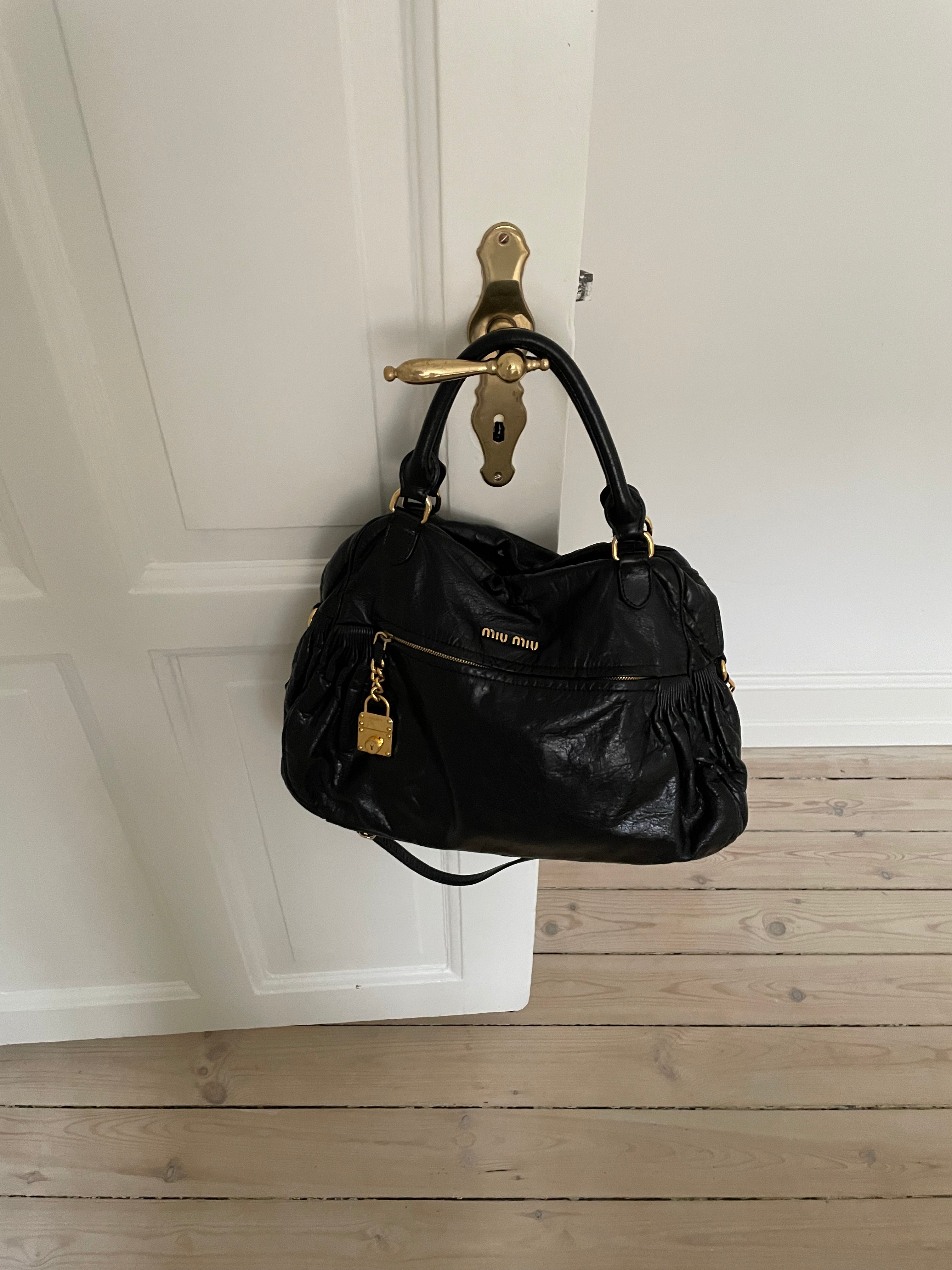 Miu Miu black nappa leather bag in a great condition.