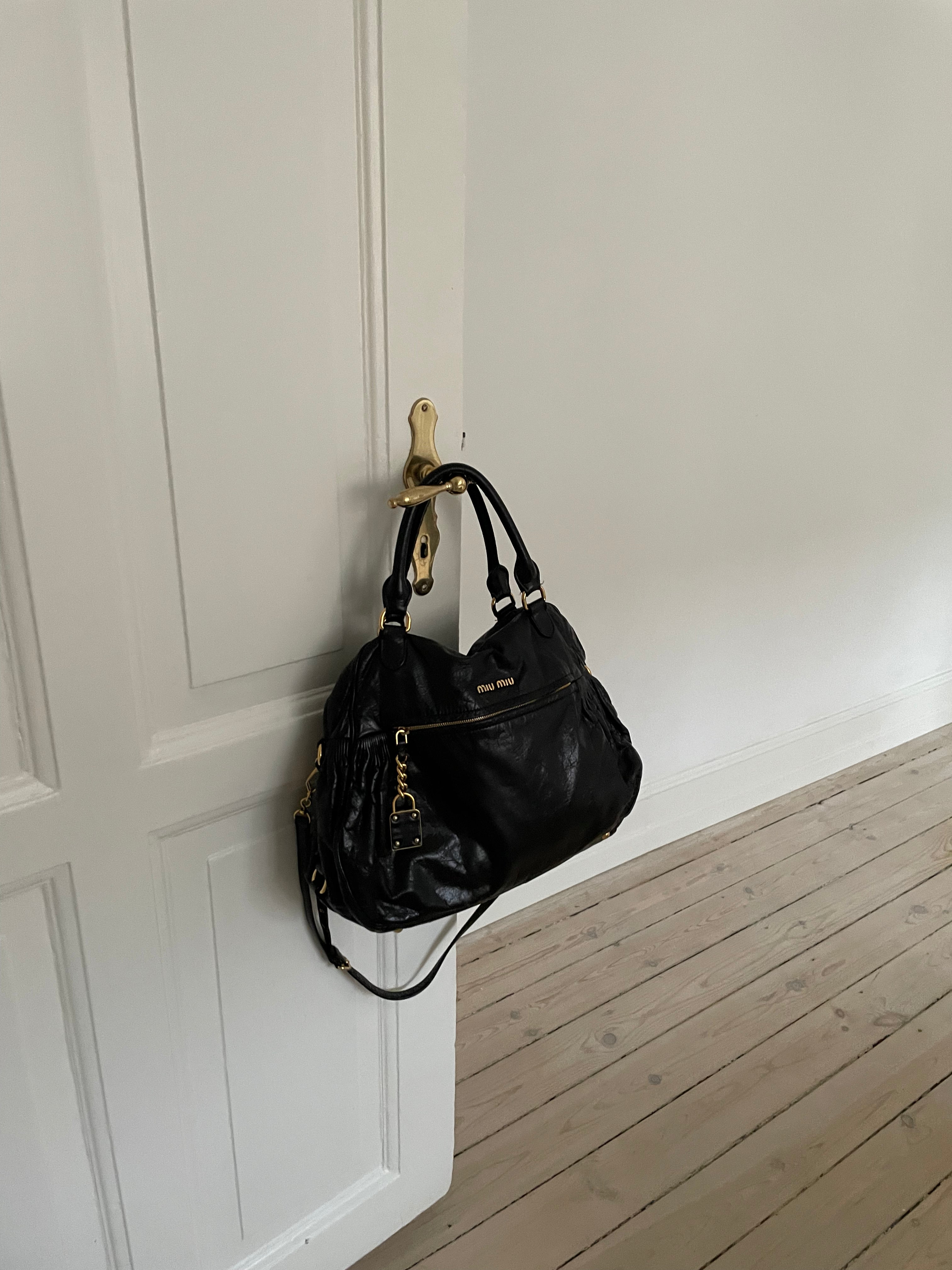 Miu Miu black nappa leather bag in a great condition.