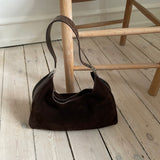 Gucci shoulder bag in dark brown suede. The leather has patina but overall the bag is in a good vintage condition.