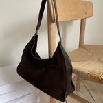 Gucci shoulder bag in dark brown suede. The leather has patina but overall the bag is in a good vintage condition.