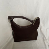 Vintage Gucci shoulder bag in brown nylon and leather with silver hardware. 