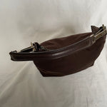 Vintage Gucci shoulder bag in brown nylon and leather with silver hardware. 