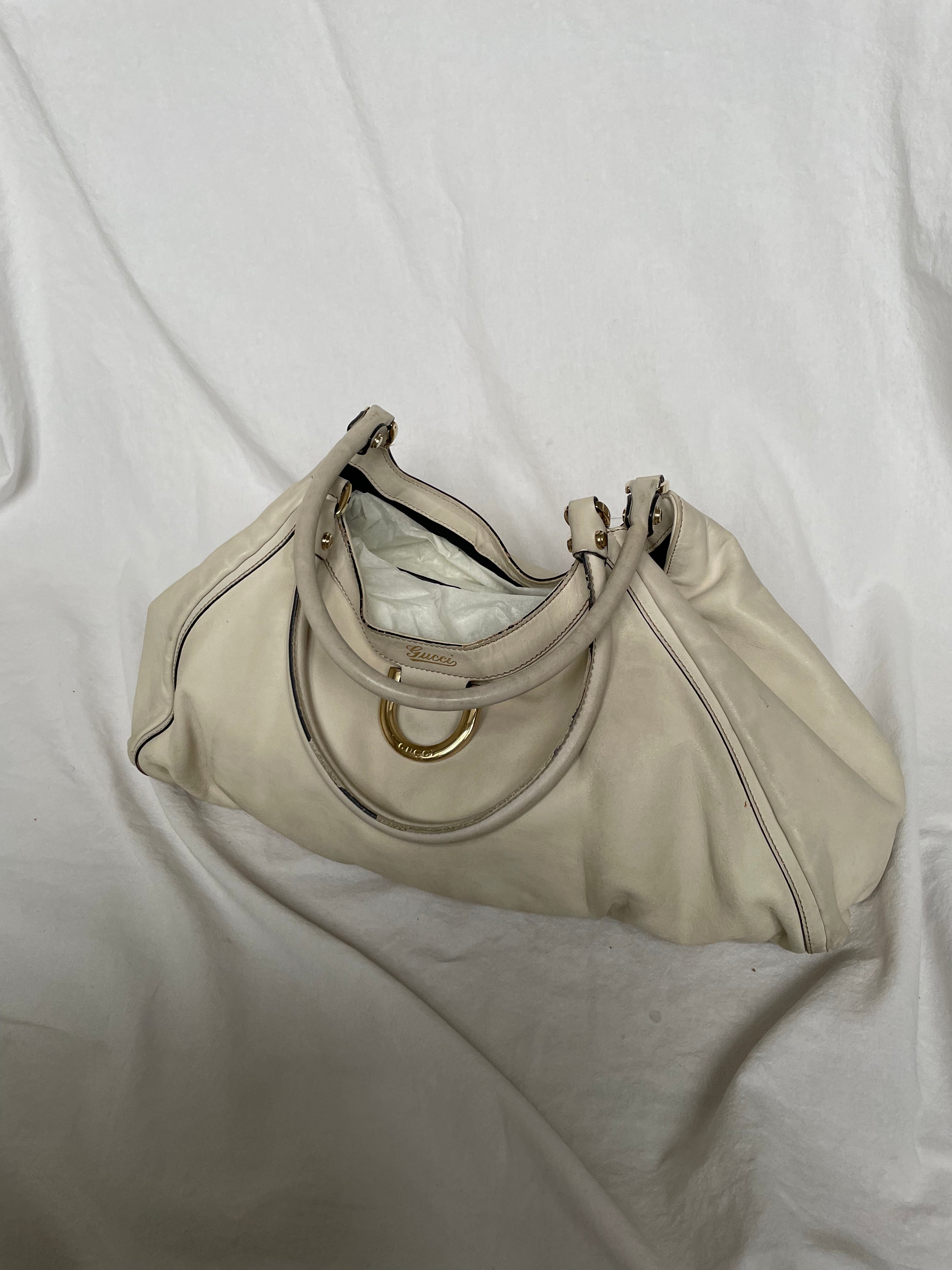 Beautiful white Gucci Abby shoulder bag with gold hardware. 