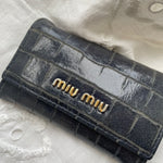 Beautiful key wallet from Miu Miu in navy leather.