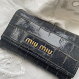 Beautiful key wallet from Miu Miu in navy leather.