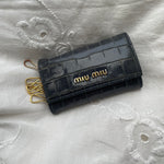 Beautiful key wallet from Miu Miu in navy leather.