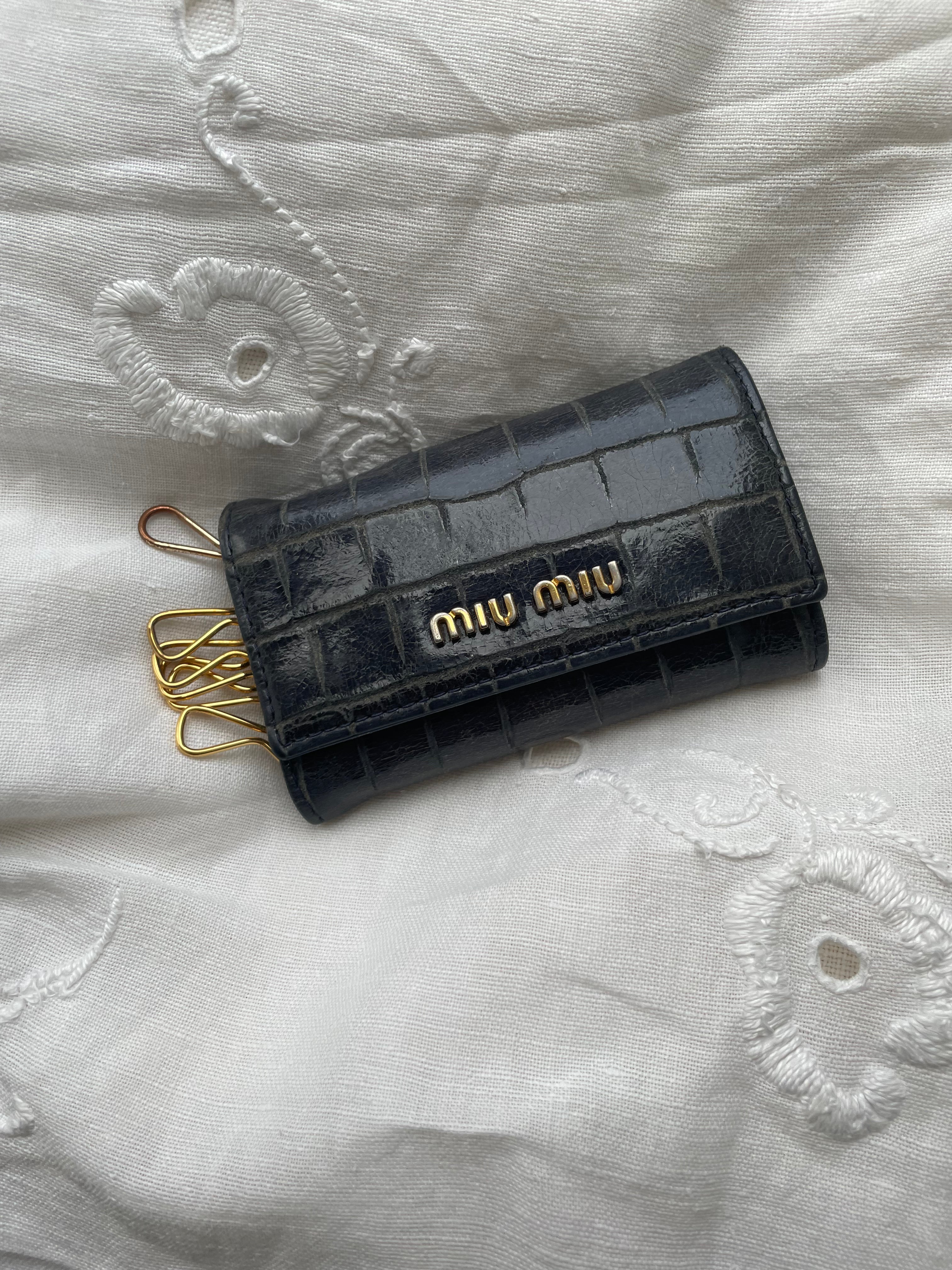 Beautiful key wallet from Miu Miu in navy leather.