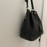 Vintage Burberrys bucket bag featuring signature canvas in the interior. The bag is overall in a good condition but the leather strap show signs of wear.&nbsp;